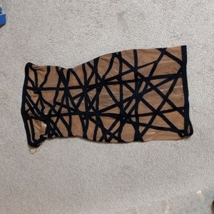 Short strapless bandage see-through dress with zipper going up the back